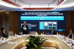 Các đại biểu thảo luận tại hội thảo. (Ảnh: Thu Hoài/TTXVN)