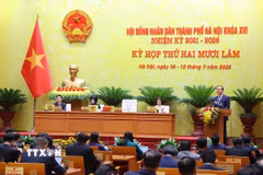 Quang cảnh kỳ họp thứ 25 Hội đồng Nhân dân thành phố Hà Nội. (Ảnh: Văn Điệp/TTXVN)