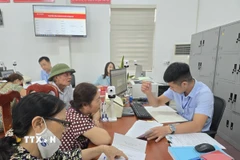 Sau hơn 1 tháng vận hành chính quyền địa phương hai cấp người dân Quảng Ninh giảm được thời gian, khoảng cách đi lại. (Ảnh: Thanh Vân/TTXVN)