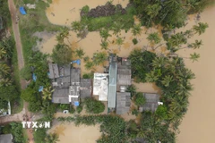 Cảnh ngập lụt sau những trận mưa lớn tại Kelaniya, Sri Lanka. (Ảnh: THX/TTXVN)
