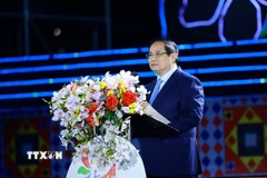 Thủ tướng Phạm Minh Chính phát biểu tại lễ khai mạc Lễ hội Hoa Ban năm 2026. (Ảnh: Dương Giang/TTXVN)
