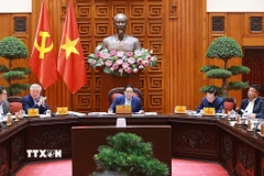 Thủ tướng Phạm Minh Chính chủ trì họp Thường trực Chính phủ về phát triển Đề án Khu thương mại tự do và Trung tâm lọc hóa dầu và năng lượng quốc gia tại Dung Quất. (Ảnh: Dương Giang/TTXVN)