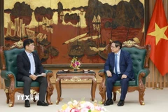 Thủ tướng Phạm Minh Chính tiếp ông Yukihito Honda. (Ảnh: Dương Giang/TTXVN)