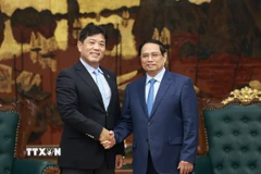 Thủ tướng Phạm Minh Chính tiếp ông Yukihito Honda. (Ảnh: Dương Giang/TTXVN)