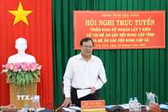 Chủ tịch Ủy ban Nhân dân tỉnh Trà Vinh Lê Văn Hẳn phát biểu tại hội nghị. (Ảnh: Thanh Hòa/TTXVN)