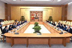 Phó Thủ tướng Hồ Đức Phớc làm việc với Đoàn Ban Cải cách doanh nghiệp của Trung ương Đảng Nhân dân Cách mạng Lào. (Nguồn: Báo Chính phủ)