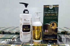 Sản phẩm mỹ phẩm giả do cơ sở của Vũ Thị Thu Hà sản xuất. (Ảnh: TTXVN phát)