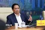 Thủ tướng Phạm Minh Chính chủ trì Hội nghị sơ kết việc thực hiện chỉ tiêu phát triển nhà ở xã hội 7 tháng đầu năm 2025. (Ảnh: Dương Giang/TTXVN)