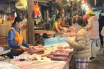 Ngày mùng 6 Tết, thị trường cơ bản trở lại trạng thái bình thường. (Ảnh: Quốc Lũy/TTXVN)