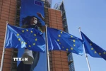 Ảnh: Cờ EU bên ngoài trụ sở Ủy ban châu Âu ở Brussels, Bỉ. (Nguồn: THX/TTXVN)