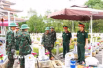 Nghi thức truy điệu, an táng 18 hài cốt liệt sỹ tại Nghĩa trang Liệt sỹ Đức Cơ, tỉnh Gia Lai. (Ảnh: Hoài Nam/TTXVN)