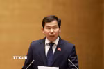 Ủy viên Ủy ban Thường vụ Quốc hội, Tổng Thư ký Quốc hội - Chủ nhiệm Văn phòng Quốc hội Lê Quang Mạnh trình bày dự thảo Nghị quyết Kỳ họp thứ nhất. (Ảnh: Tuấn Anh/TTXVN)