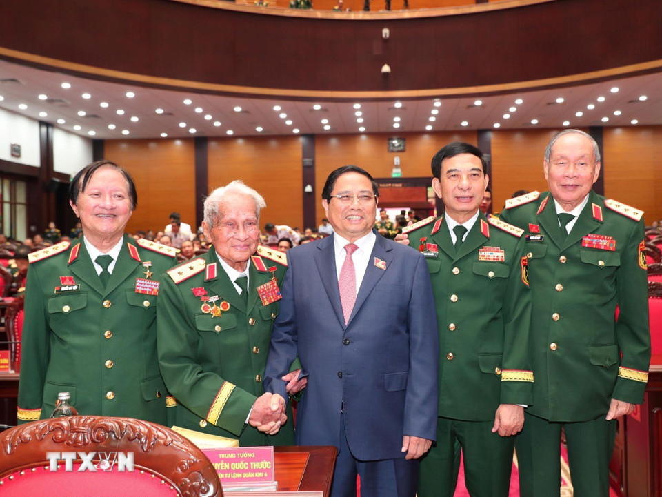 Thủ tướng Phạm Minh Chính, Đại tướng Phan Văn Giang, Bộ trưởng Bộ Quốc phòng với các đại biểu. (Ảnh: Trọng Đức/TTXVN)