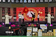 Cộng đồng người Việt Nam tại thành phố Jeonju, tỉnh Jeonbuk, Hàn Quốc, tổ chức chương trình gặp mặt mừng Xuân với nhiều hoạt động văn hóa. (Ảnh: Đức Thắng/TTXVN)