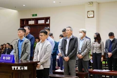 Các bị cáo tại phiên tòa phúc thẩm. (Ảnh: Phạm Kiên/TTXVN)