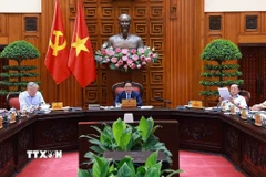 Thủ tướng Phạm Minh Chính chủ trì cuộc họp với các bộ, ngành để chuẩn bị đàm phán thương mại với Hoa Kỳ. (Ảnh: Dương Giang/TTXVN)