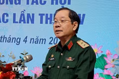 Ông Nguyễn Hữu Chính, Chủ tịch Hội Nạn nhân chất độc da cam/dioxin Việt Nam phát biểu tại hội nghị. (Ảnh: Thanh Hải/TTXVN)