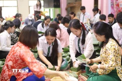 Đậm sắc màu văn hóa Việt trong ngày Tết cổ truyền tại Lào