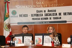 Lễ ký kết chương trình nghị sự hợp tác nghị viện Việt Nam-Mexico. (Ảnh: Phi Hùng/TTXVN)