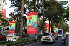 Đường Nam Kỳ Khởi Nghĩa, TP. Hồ Chí Minh rợp cờ hoa, sẵn sàng cho Ngày hội toàn dân. (Ảnh: Thanh Vũ/TTXVN)