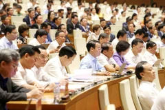 Đại biểu tham dự hội nghị tại điểm cầu chính Hội trường Diên Hồng, Nhà Quốc hội. (Ảnh: Phương Hoa/TTXVN)