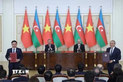 Tổng Bí thư Tô Lâm và Tổng thống Azerbaijan Ilham Aliyev chứng kiến trao đổi Bản ghi nhớ trong lĩnh vực thăm dò và khai thác, dịch vụ kỹ thuật dầu khí và đào tạo giữa Tập đoàn Công nghiệp - Năng lượng Quốc gia Việt Nam và Bộ Kinh tế Azerbaijan. (Ảnh: Thống Nhất/TTXVN)