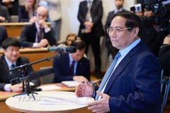 Thủ tướng Phạm Minh Chính phát biểu về chính sách của Việt Nam tại Đại học Kinh tế Stockholm. (Ảnh: Dương Giang/TTXVN)