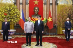 Chủ tịch nước Lương Cường với Đại sứ Cộng hòa Philippines tại Việt Nam Francisco Noel R. Fernandez III. (Ảnh: Lâm Khánh/TTXVN)