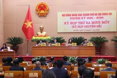 Chủ tọa điều hành kỳ họp. (Ảnh: Văn Điệp/TTXVN)