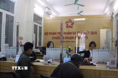Bộ phận một cửa tại UBND phường Phạm Đình Hổ, Hà Nội. (Ảnh: Nguyễn Thắng/TTXVN)