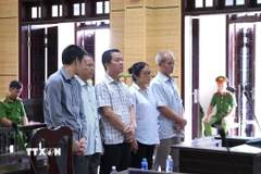 Các bị cáo tại phiên tòa. (Ảnh: Minh Phú/TTXVN)