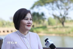 Bà Phạm Thị Minh Hường, doanh nhân Việt Nam tại Lào, Phó Chủ tịch Hiệp hội Doanh nhân Việt Nam ở nước ngoài, chia sẻ cảm xúc. (Ảnh: Xuân Tú/TTXVN)