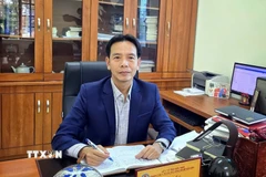 Giám đốc Trung tâm Y tế các Khu công nghiệp tỉnh Bắc Ninh Nguyễn Hữu Sơn góp ý vào dự thảo. (Ảnh: Danh Lam/TTXVN)