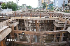 Thi công hầm chui Giải Phóng-Kim Đồng. (Ảnh: Vũ Quang/TTXVN)