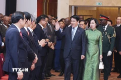 Chủ tịch nước Lương Cường và Phu nhân dự Lễ kỷ niệm 50 năm thiết lập quan hệ ngoại giao Việt Nam-Angola. (Ảnh: Lâm Khánh/TTXVN)