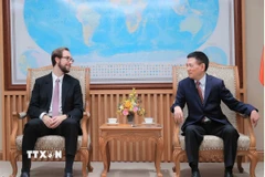 Phó Thủ tướng Hồ Đức Phớc tiếp Phó Chủ tịch phụ trách Phát triển và Đối tác toàn cầu Tập đoàn Tether Marco Dal Lago. (Ảnh: An Đăng/TTXVN)