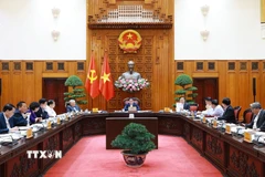 Thủ tướng Phạm Minh Chính chủ trì họp Thường trực Chính phủ về các dự án đường sắt. (Ảnh: Dương Giang/TTXVN)