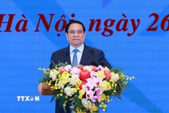 Thủ tướng Phạm Minh Chính phát biểu tại Hội nghị tổng kết Chương trình và Phong trào thi đua “Cả nước chung tay xóa nhà tạm, nhà dột nát”. (Ảnh: Dương Giang/TTXVN)