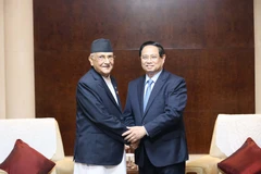 Thủ tướng Phạm Minh Chính và Thủ tướng Nepal K.P Sharma Oli. (Ảnh: Công Tuyên/TTXVN)