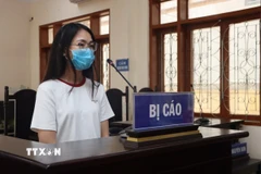 Bị cáo Phạm Thị Thỏa tại phiên tòa. (Ảnh: Hoàng Ngà/TTXVN)
