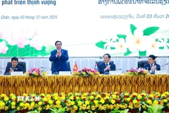 Thủ tướng Phạm Minh Chính tham dự Hội nghị xúc tiến đầu tư Việt Nam-Lào năm 2025. (Ảnh: Dương Giang/TTXVN)