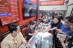 Toàn bộ hệ thống cửa hàng hiện mở cửa hoạt động bình thường. (Ảnh: Phan Phương/TTXVN)