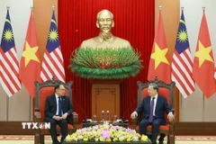 Tổng Bí thư Tô Lâm tiếp Thủ tướng Malaysia Anwar Ibrahim. (Ảnh: Thống Nhất/TTXVN)
