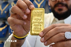 Vàng miếng được bán tại cửa hàng ở Kuwait City, Kuwait. (Ảnh: THX/TTXVN)