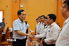 Bí thư Thành ủy TP. Hồ Chí Minh Trần Lưu Quang tiếp xúc cử tri tại phường Bà Rịa. (Ảnh: Hoàng Nhị/TTXVN)