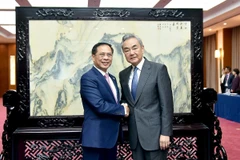 Phó Thủ tướng Bùi Thanh Sơn hội đàm với Bộ trưởng Ngoại giao Trung Quốc. (Ảnh: VOV)