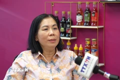 Bà Phạm Thị Hoa - Phó Tổng Giám đốc công ty Fusion Foods tại Nga, trả lời phỏng vấn TTXVN. (Ảnh: Trần Hải/TTXVN)