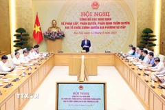 Quang cảnh Hội nghị công bố Nghị định về phân cấp, phân quyền khi tổ chức chính quyền địa phương 2 cấp. (Ảnh: Phạm Kiên/TTXVN)