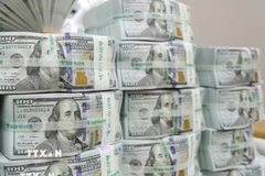 Đồng USD. (Ảnh: AFP/TTXVN)
