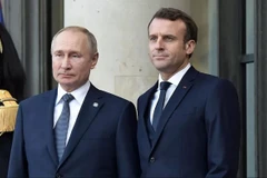 Tổng thống Nga Vladimir Putin và Tổng thống Pháp Emmanuel Macron. (Ảnh: RIA Novosti)